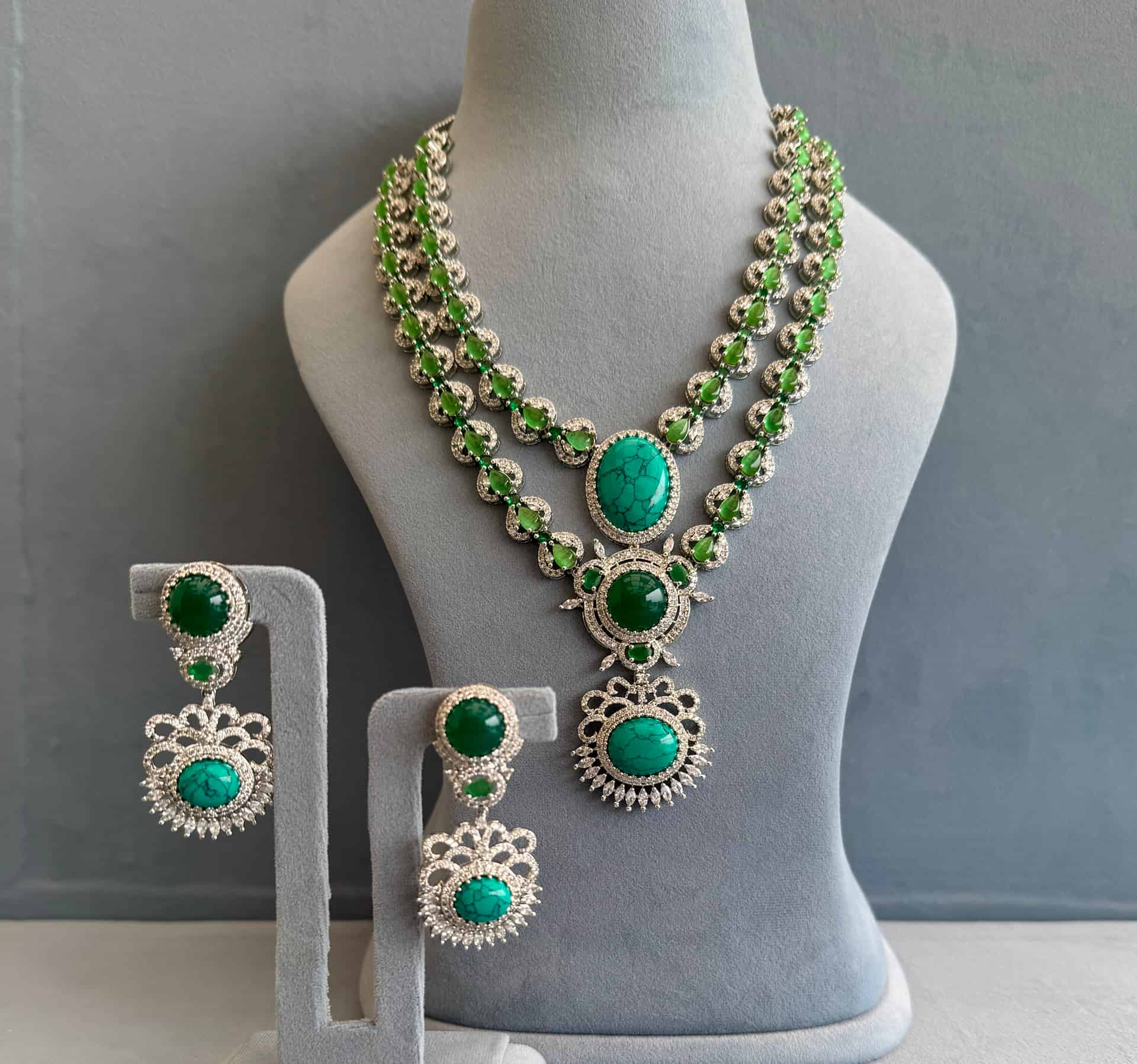 Double-layered Emerald Turquoise-marbled Gemstones With Heavy American Diamond Work Paired With Dangler Earrings